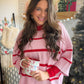 A Fresh Pop of Pink

The Pink Luxe Crew Sweater by Cotierra brings a playful touch to laid-back dressing with striped detail and an oversized, boxy silhouette. Lightweight yarn and dropped shoulders give it an easygoing feel, while open-knit stripe detail adds texture that makes even a simple jeans-and-sweater outfit feel thoughtfully styled.

Picture a slow morning coffee turning into an afternoon browsing your favorite shops. Pair this pullover with denim and sneakers for the day, then swap in ankle boots