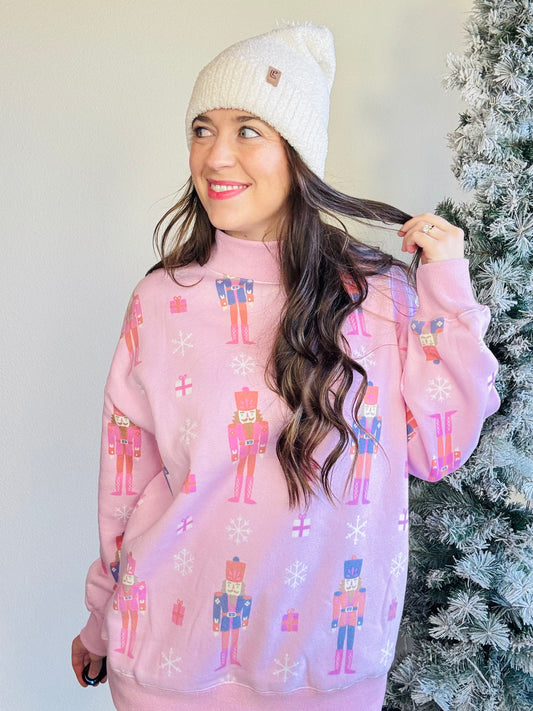 Katydid

With its oversized fit and playful vibe, it pairs perfectly with leggings, fuzzy slippers, and your fave holiday tumbler.Whether you're lounging or lighting up the tree, this sweatshirt brings the festive vibes all season long.