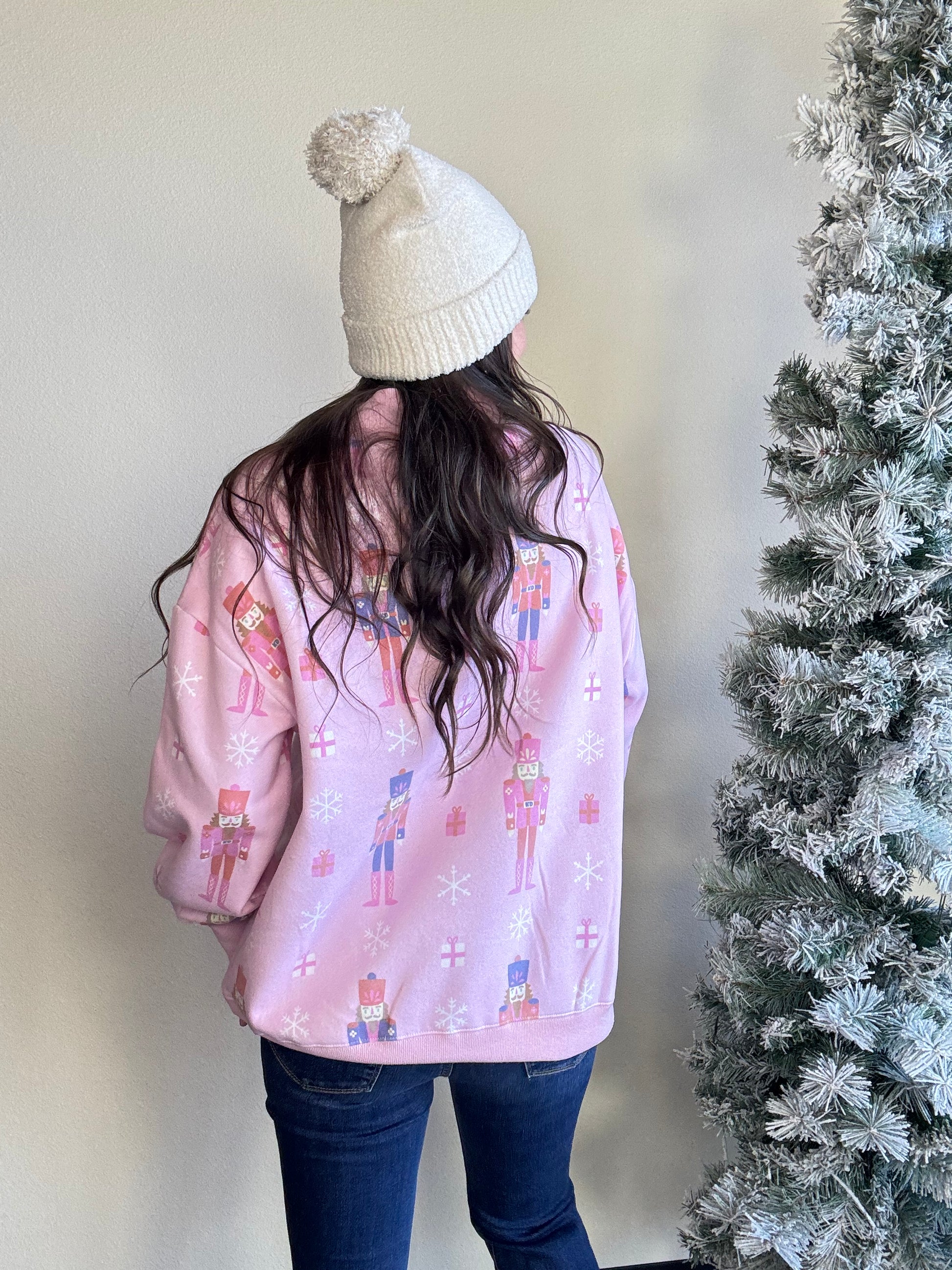 Katydid

With its oversized fit and playful vibe, it pairs perfectly with leggings, fuzzy slippers, and your fave holiday tumbler.Whether you're lounging or lighting up the tree, this sweatshirt brings the festive vibes all season long.