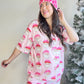 Katy Did

Whether you're lounging fireside or unwrapping presents in style, these pink Christmas pajamas are the ultimate mix of cozy and cute. With a relaxed fit and playful holiday print, they're comfy enough to snooze in and cute enough for literally every seasonal selfie.