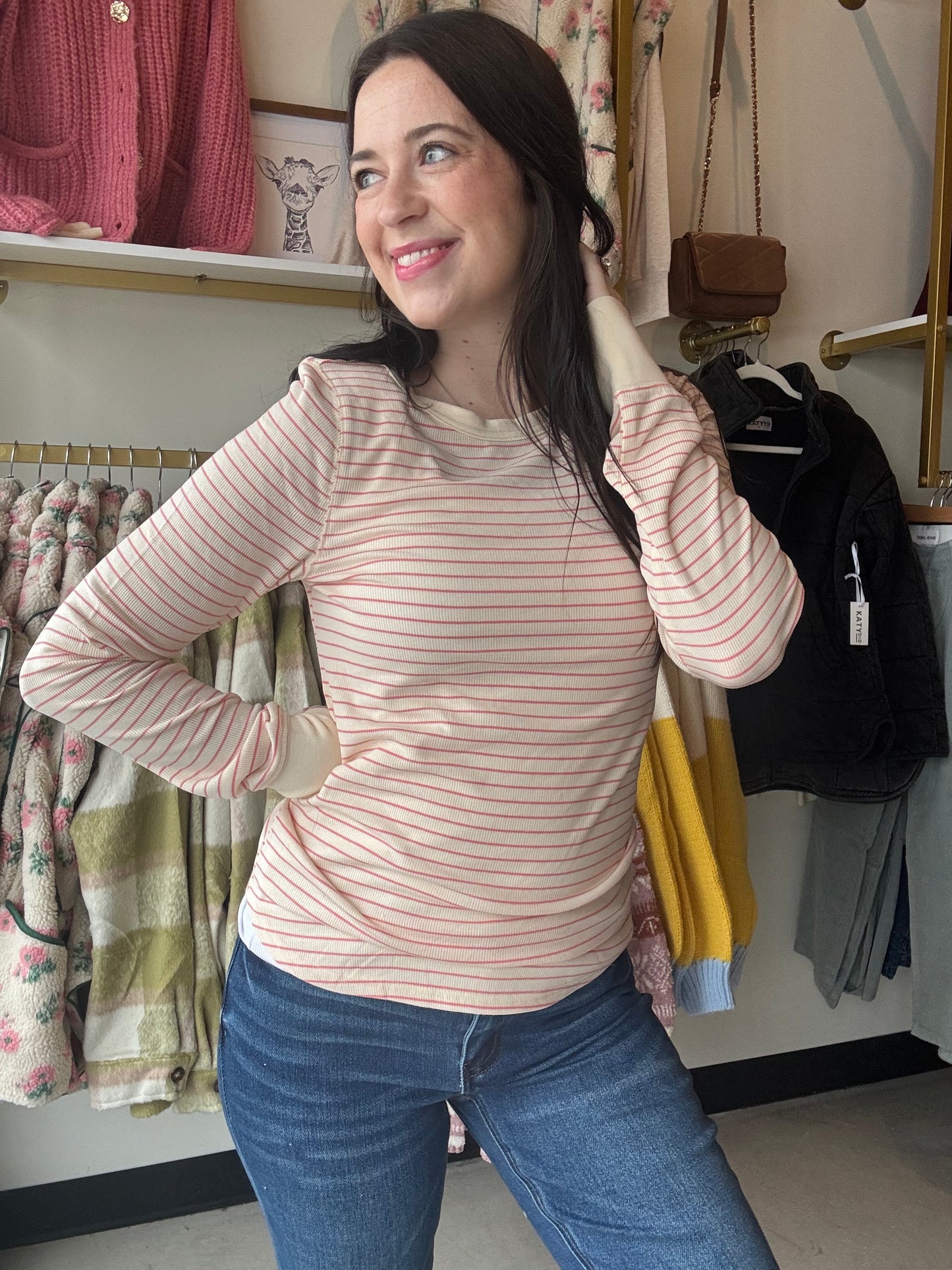 Thread and Supply&nbsp;

So classic and effortless, this essential long sleeve tee from our basics collection is featured in a relaxed silhouette and crew neckline.&nbsp;

Long-sleeved top
Crew neckline
Measurements for a size small:

Length: 25.5"
Chest: 16"
Sleeve length: 25.5"
Sweep: 17 1/4"
Fabric Content/Care:&nbsp;

95% Rayon
5% Spandex