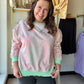 Embrace effortless charm with this vibrant pink and mint green striped knit pullover. Featuring a playful lettuce hem and a relaxed oversized fit, it’s the ultimate cozy-chic essential for transitional weather. Elevate your everyday style with a refreshing pop of pastel comfort

Soft breathable knit for all-day comfort.
Trendy lettuce hem adds feminine flair.
Relaxed fit for effortless layering.
Vibrant pastel stripes brighten your look.
Durable ribbing maintains its shape.
Perfect for casual-chic weekend s