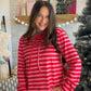 Brighten your casual lineup with the Red Pink Stripe Funnel Neck by Staccato. The red-and-pink stripe combination brings a playful pop of color, while a drawstring funnel neckline gives this long-sleeve top a distinctive finish that stands apart from your everyday crewneck.

Made in Hacci striped jersey knit, it’s a lovely pick for a coffee date, a little weekend shopping, or an afternoon spent catching up with friends. Imagine it paired with your favorite denim and sneakers for an outfit that feels thought