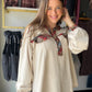 Easel

WASHED TERRY PULLOVER
-OVERSIZED PULLOVER TOP
-MINERAL WASHED
-RELAXED, LOOSE FIT SILHOUETTE
-BUTTON FRONT PLACKET
-LONG BALLOON SLEEVES
-CONTRAST PLAID DETAILING
-SMALL MEASUREMENTS : LENGTH - 27" &amp; BUST - 23"

Fabric: KNIT
Content: 60% COTTON 40% POLYESTER&nbsp;
WASHED TERRY PULLOVER