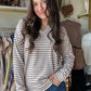 Experience the perfect balance of comfort and warmth with the Plum Stripe V Neck Top. Crafted from a super soft, heavy-weight fabric, this top offers a cozy feel that sits comfortably between a long sleeve shirt and a sweatshirt. Its refined texture and weight make it ideal for layering or wearing alone in cooler weather, providing both style and functionality.

Staccato