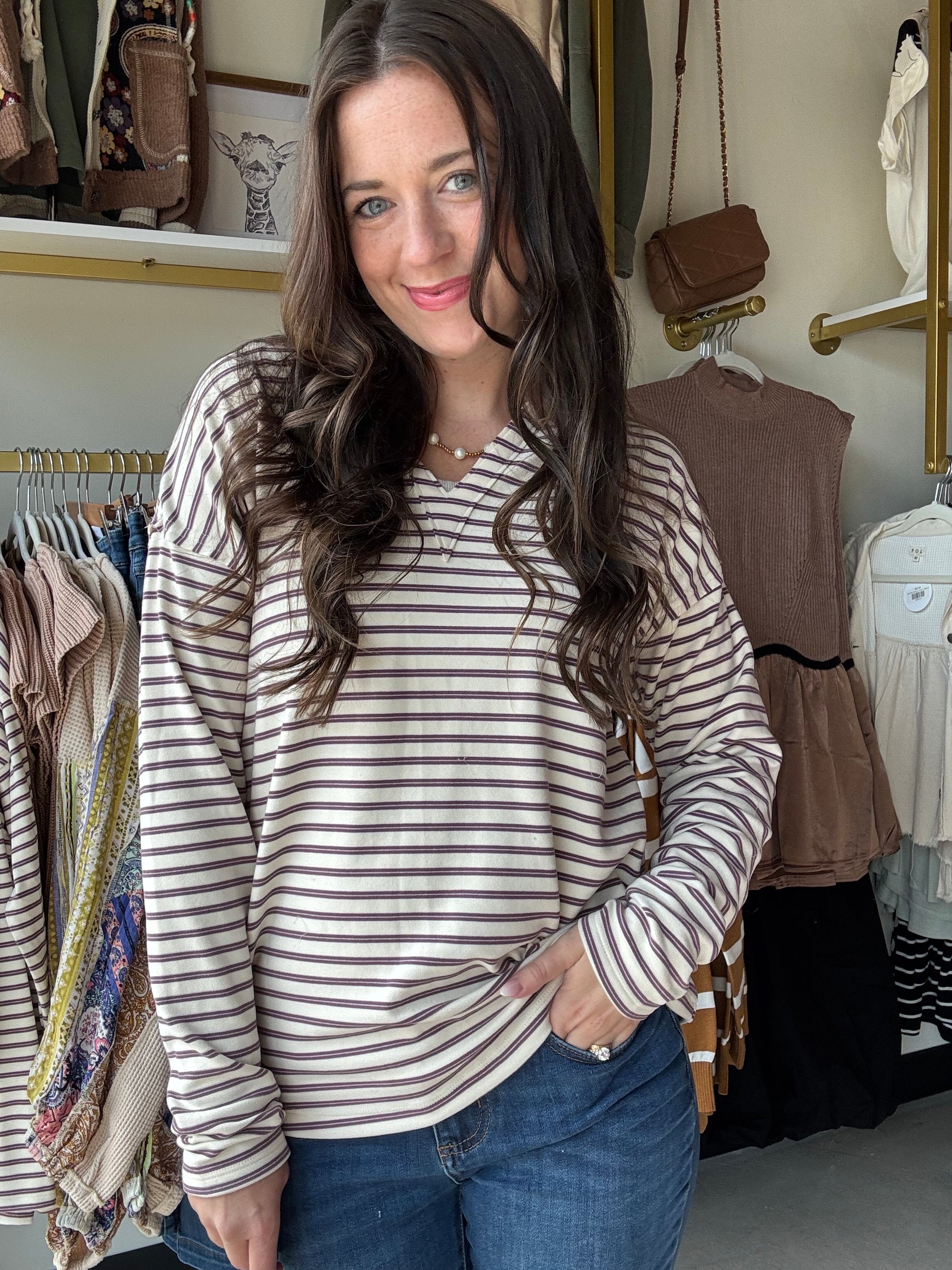 Experience the perfect balance of comfort and warmth with the Plum Stripe V Neck Top. Crafted from a super soft, heavy-weight fabric, this top offers a cozy feel that sits comfortably between a long sleeve shirt and a sweatshirt. Its refined texture and weight make it ideal for layering or wearing alone in cooler weather, providing both style and functionality.

Staccato