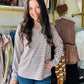 Experience the perfect balance of comfort and warmth with the Plum Stripe V Neck Top. Crafted from a super soft, heavy-weight fabric, this top offers a cozy feel that sits comfortably between a long sleeve shirt and a sweatshirt. Its refined texture and weight make it ideal for layering or wearing alone in cooler weather, providing both style and functionality.

Staccato
