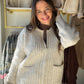 POL

Textured rib-knit zip cardigan featuring soft speckled yarn detailing throughout for a cozy, vintage-inspired look. Designed with a mock neckline, two-way zip-front closure, and a subtly fitted silhouette that flatters the figure. Finished with ribbed patch pockets, long sleeves, and a midweight knit fabrication for warmth, comfort, and effortless everyday layering.
--------------------------------------------------------------------------
Fabric Contents:
-&nbsp;46%POLYESTER 21%ACRYLIC 28%NYLON 5%WOOL