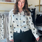 Bibi

Elevate your everyday wardrobe with this luxuriously silky Bibi blouse, featuring bold polka dots and dramatic balloon sleeves. This sophisticated button-up seamlessly transitions from office hours to evening cocktails with a polished, high-fashion finish.

Premium silky fabric feels like luxury.
Dramatic balloon sleeves add modern flair.
Classic ivory and black polka dots.
Polished button-up front and cuffs.
Seamlessly transitions from office to evening.
Flattering silhouette for all-day comfort.