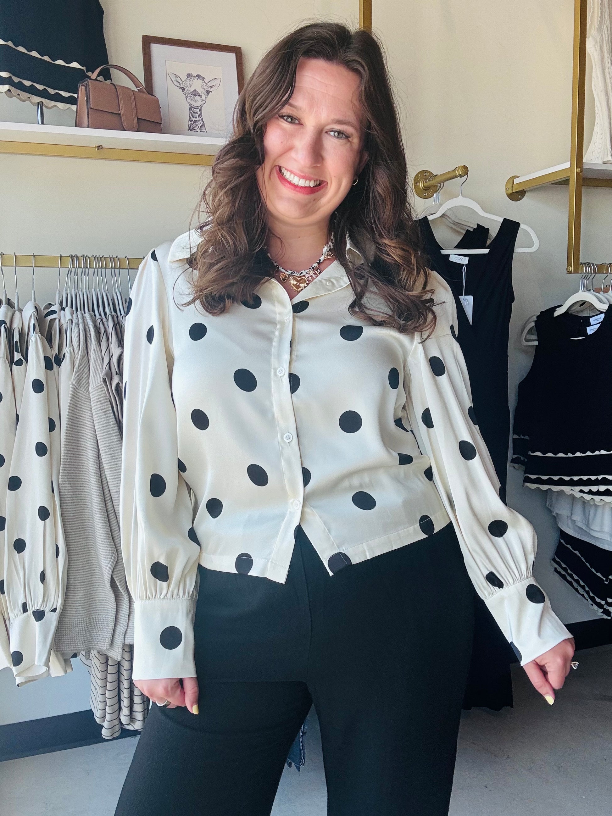 Bibi

Elevate your everyday wardrobe with this luxuriously silky Bibi blouse, featuring bold polka dots and dramatic balloon sleeves. This sophisticated button-up seamlessly transitions from office hours to evening cocktails with a polished, high-fashion finish.

Premium silky fabric feels like luxury.
Dramatic balloon sleeves add modern flair.
Classic ivory and black polka dots.
Polished button-up front and cuffs.
Seamlessly transitions from office to evening.
Flattering silhouette for all-day comfort.
