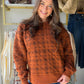 The Pumpkin Plaid Quilted Pullover by Staccato brings cozy seasonal character to everyday outfits. Its pumpkin-inspired plaid and quilted look make it an easy statement layer for crisp mornings, weekend plans, and everything on your fall calendar.

Pair it with your favorite denim and boots for a polished autumn outfit, or keep things casual with leggings and sneakers. It is the kind of pullover you will reach for when you want comfort without sacrificing personality.

Details

Pumpkin-inspired plaid design