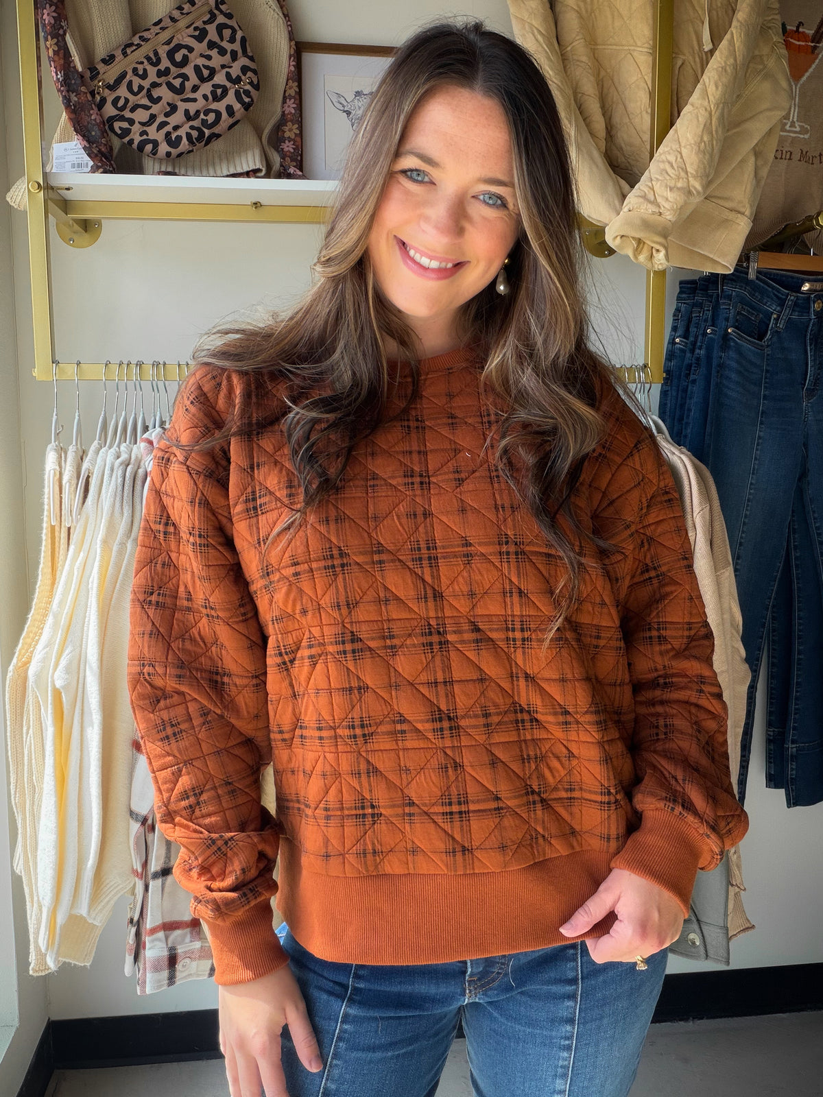 The Pumpkin Plaid Quilted Pullover by Staccato brings cozy seasonal character to everyday outfits. Its pumpkin-inspired plaid and quilted look make it an easy statement layer for crisp mornings, weekend plans, and everything on your fall calendar.

Pair it with your favorite denim and boots for a polished autumn outfit, or keep things casual with leggings and sneakers. It is the kind of pullover you will reach for when you want comfort without sacrificing personality.

Details

Pumpkin-inspired plaid design