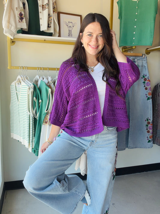 Staccato

Effortless layering meets textured elegance with this open-front dolman cardigan. The relaxed three-quarter sleeves and crochet-inspired knit create a breezy, bohemian silhouette perfect for casual days or dressed-up occasions. Lightweight and versatile, it pairs beautifully over tees, dresses, or tanks for an instantly polished look.