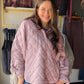 A little texture makes a casual day feel more considered. The Mauve Quilted Snap Pullover by Rae Mode gives you that easy throw-on layer with a quilted look and snap detail, all in a soft mauve tone that plays beautifully with denim and neutrals. Grab it for a coffee run, a relaxed afternoon, or the kind of day that calls for one more layer.

Details you'll love

Quilted look with snap accents.
Mauve color for an easy-to-style pop of softness.
Designed in the USA by Rae Mode.
Fabric: 78% polyester, 18% cott