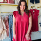 Umgee

Embrace effortless summer elegance in this vibrant raspberry linen-blend dress. Featuring feminine flutter sleeves and a breezy tiered silhouette, it offers the ultimate combination of style and breathable comfort. The delicate scalloped split V-neck adds a chic, artisanal touch to your sun-drenched wardrobe.

Cooling linen-cotton blend all-day comfort.
Flattering tiered silhouette moves beautifully.
Playful flutter sleeves add charm.
Elegant scalloped V-neck detail.
Vibrant raspberry hue turns heads