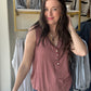 Be prepared for a great time under the sun with our Brick V Neck Button Tank. This sleeveless V-neck henley top is ideal for casual outings and is made from a comfy knit fabric. The addition of button detailing gives it a charming touch.