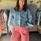 Wishlist

Elevate your everyday aesthetic with this ultra-soft Wishlist denim pullover, featuring dramatic balloon sleeves and a flattering V-neckline. The raw, exposed hem adds a modern, edgy finish to this effortless boho-chic essential. Perfect for transitions, it pairs seamlessly with your favorite flares, leggings, or knit pants for instant style.

Dramatic balloon sleeves&nbsp;for statement style.
Flattering V-neckline&nbsp;for effortless layering.
Edgy raw hem&nbsp;adds modern detail.
Premium soft-wa