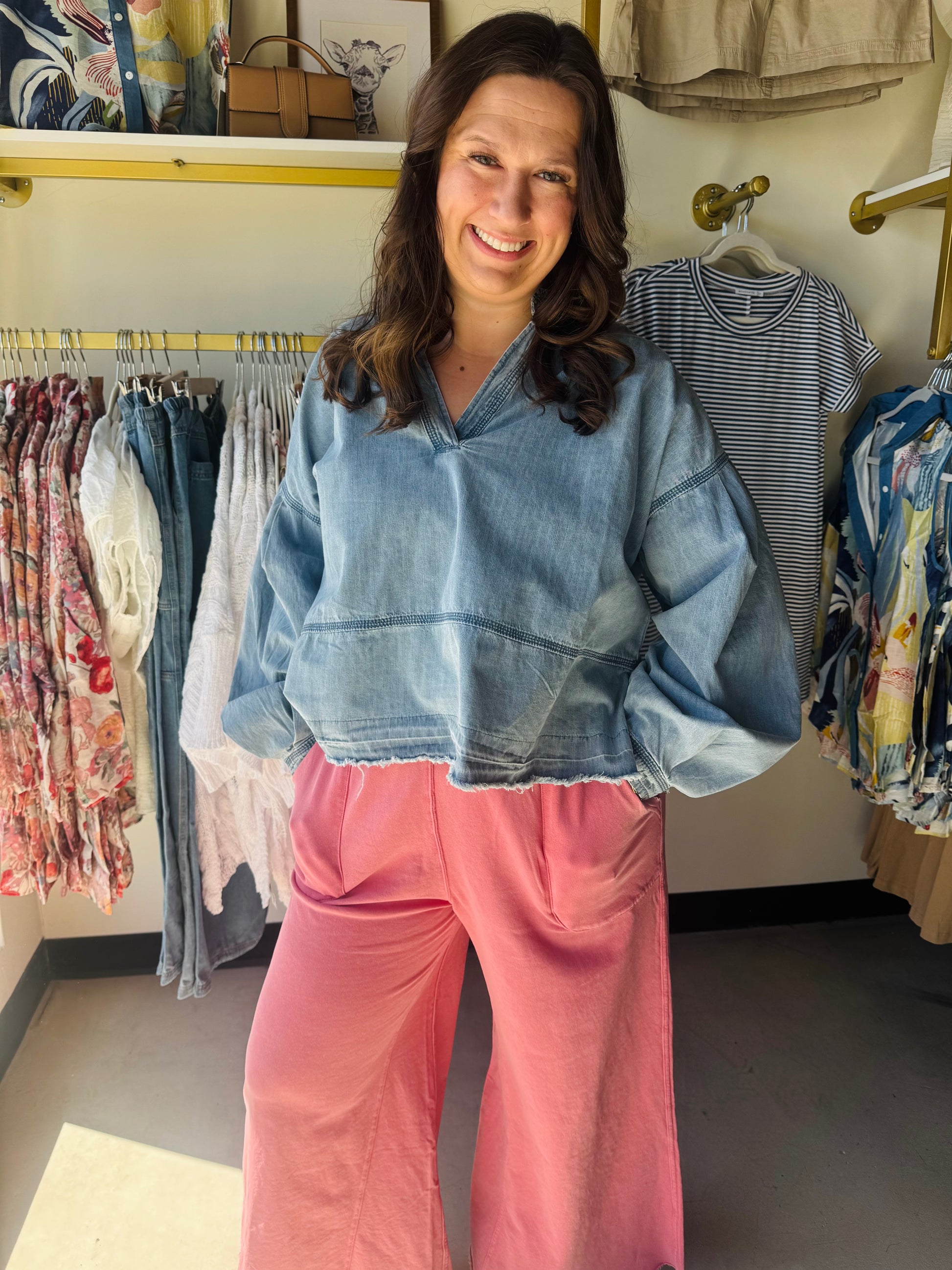 Wishlist

Elevate your everyday aesthetic with this ultra-soft Wishlist denim pullover, featuring dramatic balloon sleeves and a flattering V-neckline. The raw, exposed hem adds a modern, edgy finish to this effortless boho-chic essential. Perfect for transitions, it pairs seamlessly with your favorite flares, leggings, or knit pants for instant style.

Dramatic balloon sleeves&nbsp;for statement style.
Flattering V-neckline&nbsp;for effortless layering.
Edgy raw hem&nbsp;adds modern detail.
Premium soft-wa