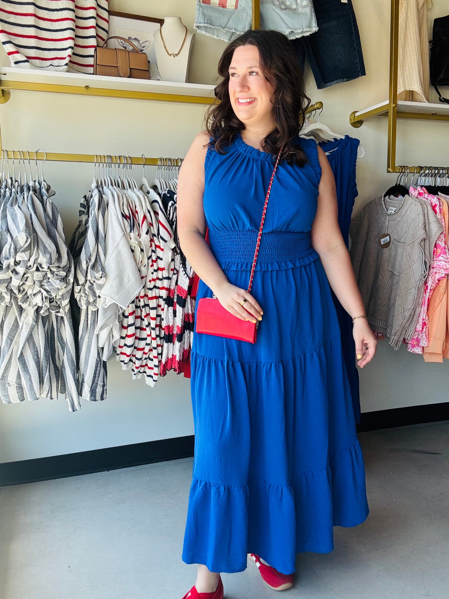 Umgee

Turn heads in this vibrant royal blue Umgee midi, designed to flatter every curve with a comfortable smocked waistband and flowing tiered skirt. This sleeveless stunner blends effortless style with functional side pockets, making it your go-to choice for summer brunches or sunset weddings.

Flattering smocked waist defines your silhouette.
Convenient side pockets for daily essentials.
Chic ruffle-trim neckline adds feminine detail.
Flowy tiered skirt offers effortless movement.
Vibrant royal blue ens