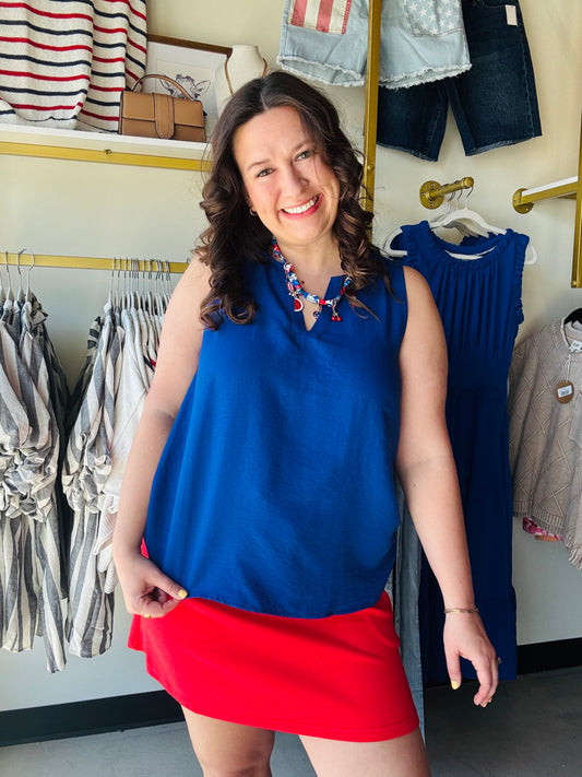 Staccato

Elevate your wardrobe with this Staccato royal blue tank, featuring a modern split neckline for effortless elegance. This breathable, sleeveless essential delivers a bold pop of color and a flattering silhouette that transitions perfectly from casual days to upscale nights.
