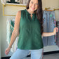Effortlessly feminine and ready for anything, the Forest Ruffle Detail Sleeveless Top by Staccato is the kind of piece you'll reach for again and again. A rich forest green hue pairs with delicate ruffle detailing for a look that feels polished without trying too hard.

The sleeveless silhouette keeps things cool and versatile — tuck it into your favorite trousers for the office, or style it with denim for a weekend out. Light, flowy, and easy to wear all season long.

Ruffle detail, sleeveless woven top
10