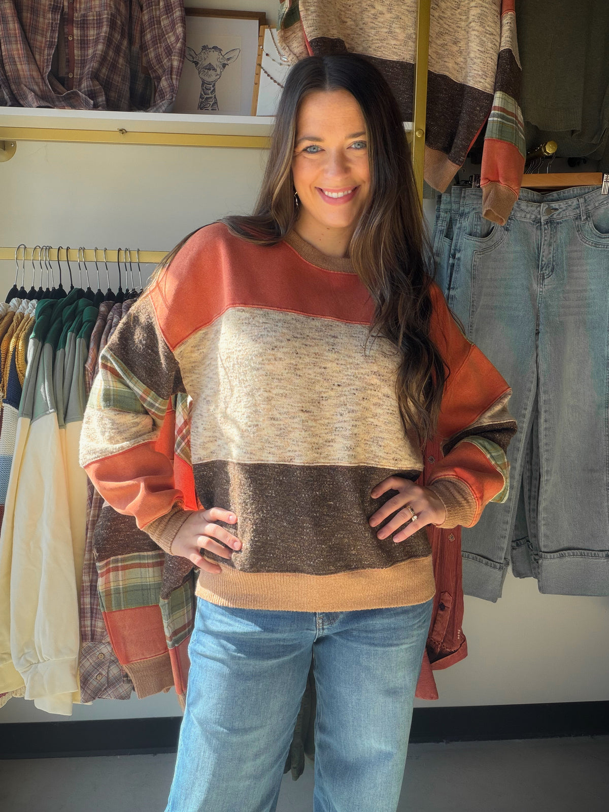 Earthy Color, Easygoing Comfort

The Rust Olive Mineral Washed Pullover by Easel brings warm, earthy color to your casual wardrobe. Its color-block design and contrasting plaid panel detail give it a playful mix of patterns, while the mineral-washed finish adds that perfectly lived-in look.

Soft mixed-knit fabric, dropped shoulders, and a relaxed, oversized silhouette make this a lovely choice for unhurried mornings and weekend plans. Pull it on for a coffee run, an afternoon browsing your favorite shops, 