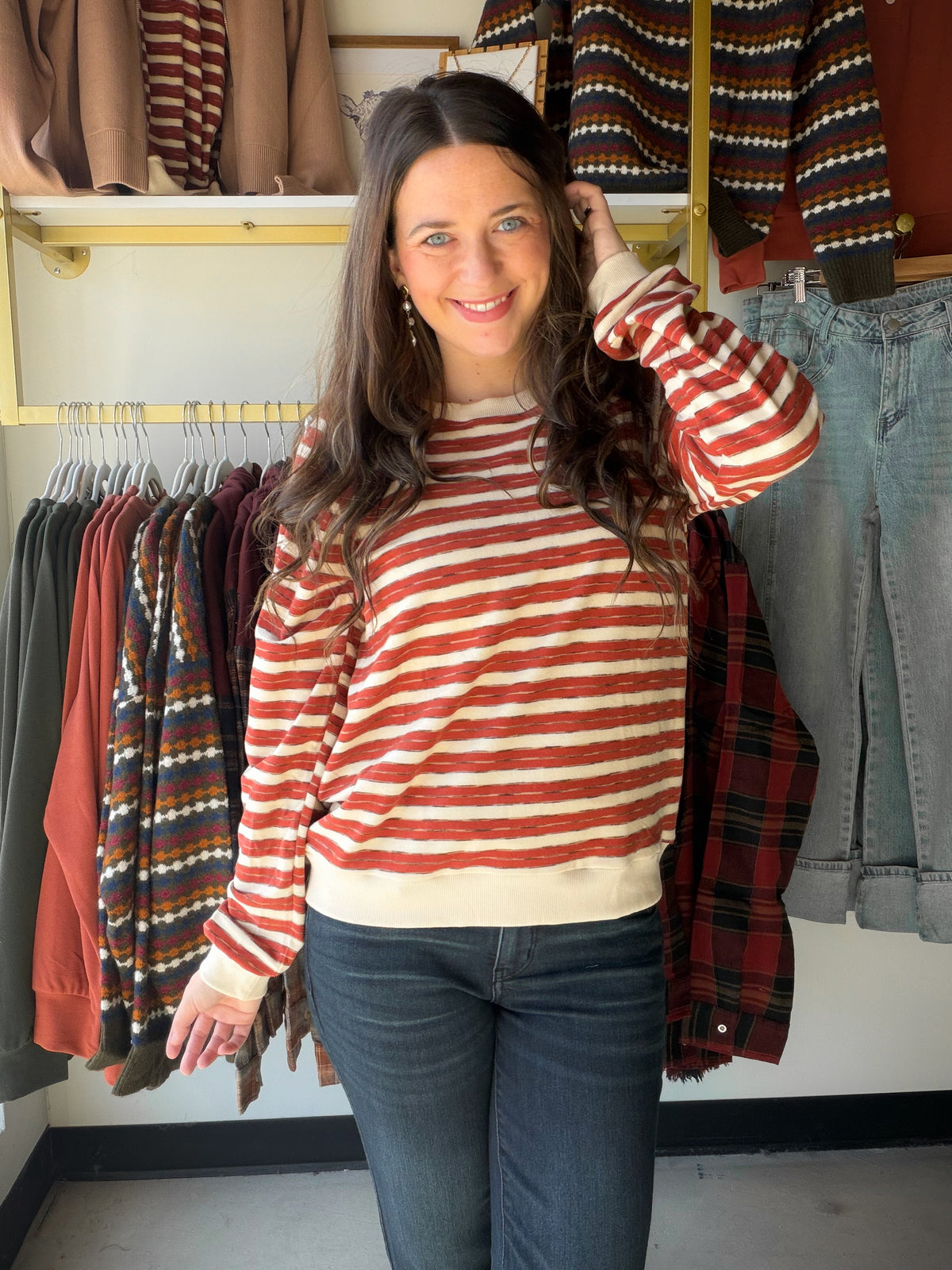 Cozy has a new favorite. The Rust Stripe Wide Neck Brushed Top from Staccato is made with a super-cozy, micro-brushed fabric that feels irresistibly soft against the skin, finished with a wide crew neckline and long sleeves for an easy, relaxed layer. Warm rust-toned stripes give it just the pop of color your cooler-weather rotation has been waiting for.

Why You'll Love It

Wide crew neckline with long sleeves
Super-cozy, micro-brushed stripe fabric with a soft, brushed feel
Warm rust palette that pairs be