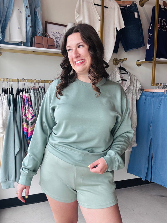 Experience ultimate luxury in this silky-soft pullover featuring a figure-flattering tapered waist. This ultra-soft crewneck blends casual comfort with a chic, defined silhouette for effortless everyday style. It’s the perfect high-end staple for your capsule wardrobe.

Buttery-soft, silky-touch premium fabric.
Flattering tapered waist defines silhouette.
Classic crewneck for effortless layering.
Versatile style: loungewear to lunch.
Lightweight warmth for all-day comfort.
Durable ribbed cuffs and hem.