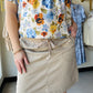 Dash

Effortless summer style meets comfort in the Sandstone Sharon Skort. Crafted from a breathable cotton blend with an elastic waist for all-day ease, this modest-length skort pairs beautifully with your favorite tees and tank tops. Perfect for warm-weather adventures, casual outings, or relaxed weekends. The versatile neutral tone works with any wardrobe, making it a go-to piece for laid-back elegance.
