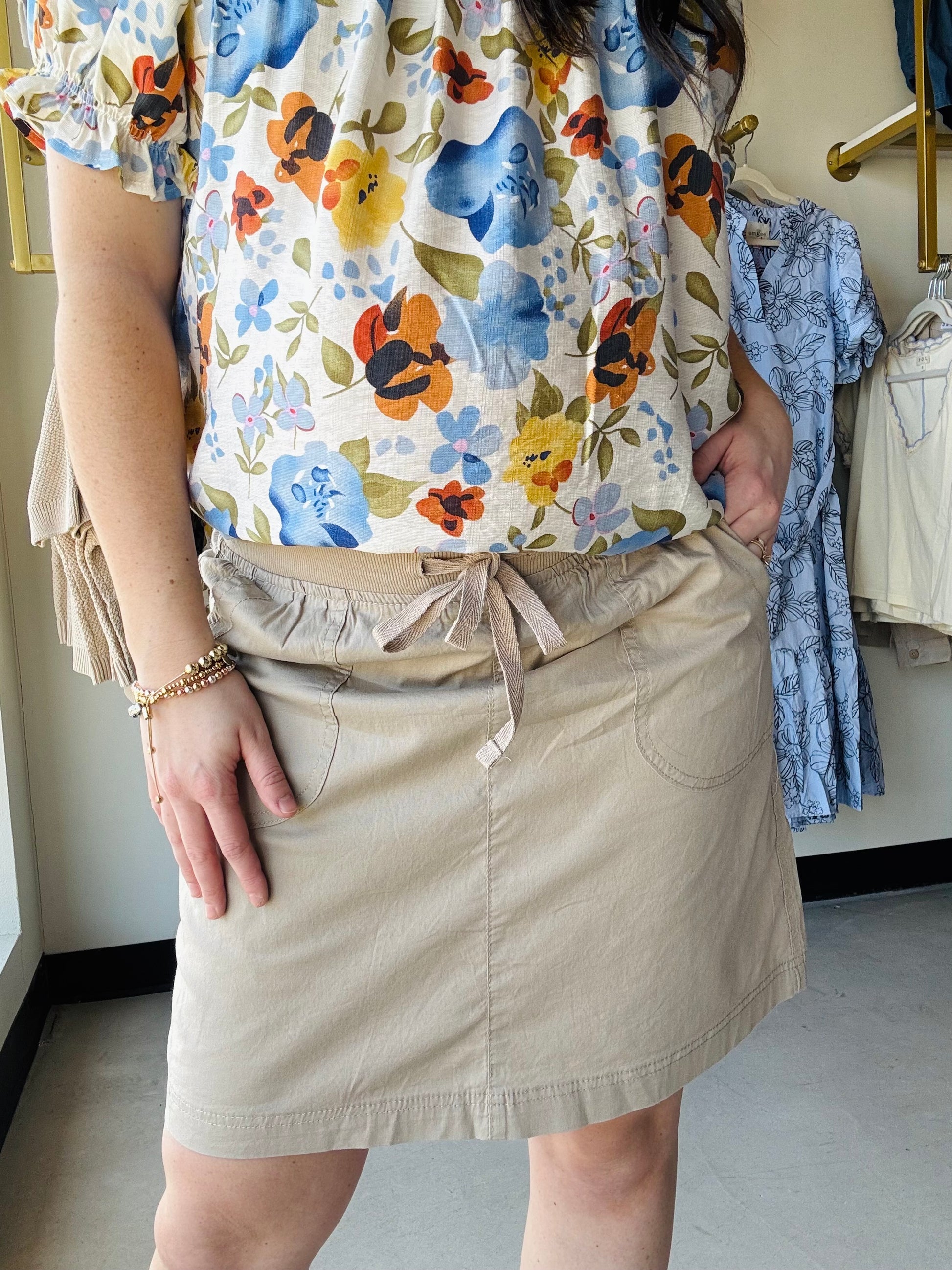 Dash

Effortless summer style meets comfort in the Sandstone Sharon Skort. Crafted from a breathable cotton blend with an elastic waist for all-day ease, this modest-length skort pairs beautifully with your favorite tees and tank tops. Perfect for warm-weather adventures, casual outings, or relaxed weekends. The versatile neutral tone works with any wardrobe, making it a go-to piece for laid-back elegance.