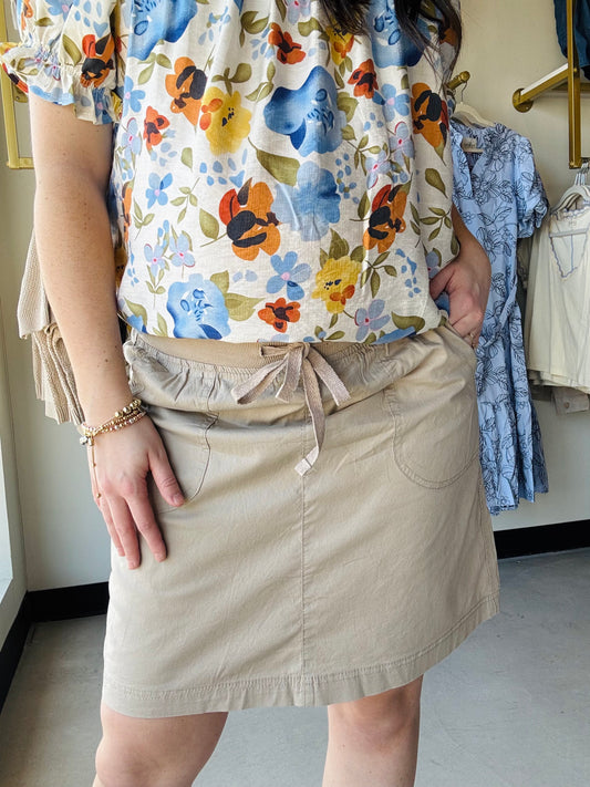Dash

Effortless summer style meets comfort in the Sandstone Sharon Skort. Crafted from a breathable cotton blend with an elastic waist for all-day ease, this modest-length skort pairs beautifully with your favorite tees and tank tops. Perfect for warm-weather adventures, casual outings, or relaxed weekends. The versatile neutral tone works with any wardrobe, making it a go-to piece for laid-back elegance.