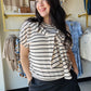 Effortless style meets everyday comfort with this striped top featuring a flattering round neckline and short sleeves. The front tie detail adds a playful touch, allowing you to adjust the fit to your preference. Perfect for casual outings, this versatile piece transitions seamlessly from day to night. The classic stripe pattern pairs easily with your favorite bottoms for endless outfit combinations.