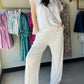 Gigio

These lounge pants offer the perfect blend of comfort and style for relaxed days at home. Crafted from soft knit fabric, these pants feature an elastic waistband for a secure, comfortable fit and convenient side pockets for everyday essentials. The neutral grey tone pairs beautifully with a matching top to create a complete cozy lounge outfit. Ideal for lounging, running errands, or unwinding in style.