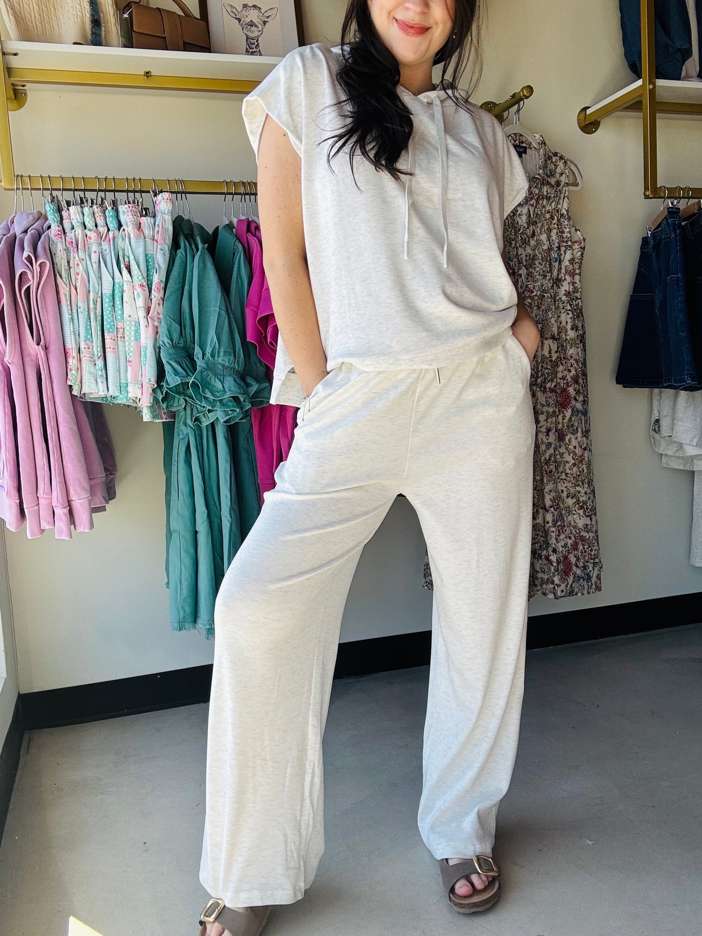 Gigio

These lounge pants offer the perfect blend of comfort and style for relaxed days at home. Crafted from soft knit fabric, these pants feature an elastic waistband for a secure, comfortable fit and convenient side pockets for everyday essentials. The neutral grey tone pairs beautifully with a matching top to create a complete cozy lounge outfit. Ideal for lounging, running errands, or unwinding in style.