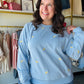 Sunday Edition

Brighten your day with this ultra-soft, sky-blue crewneck featuring delicate lemon slice embroidery. Perfectly blending coastal charm with premium comfort, it’s your new go-to for effortless, sun-kissed style

Intricate embroidered lemon slice detailing.
Dreamy, versatile sky blue hue.
Relaxed raglan sleeves for comfort.
Buttery-soft, breathable premium fabric.
Flattering ribbed cuffs and hem.
Effortless styling for every season.
Durable stitching for lasting quality.
