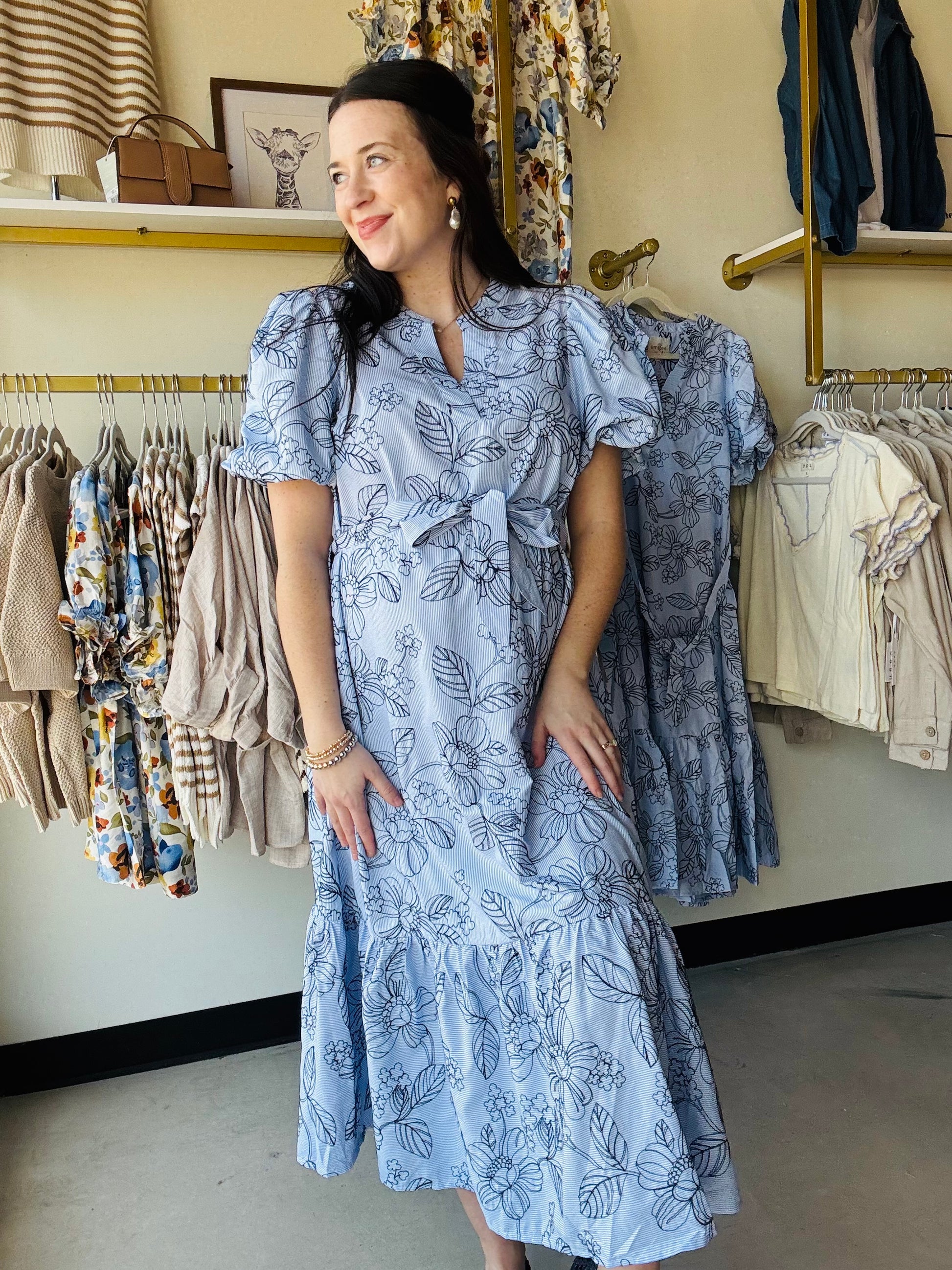 Sky Garden Belted Midi Dress

Key Features
• Embroidered 
• A-line silhouette
• Puff short sleeves
• Notched neckline
• Removable self-tie waist belt
• Tiered hem for extra movement and charm
• Sleeves Lined Only

Fabric Contents
• 55% Cotton
• 45% Polyester