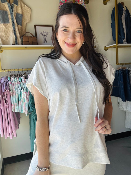 Gigio

Effortless comfort meets contemporary style with this knit sleeveless hoodie featuring delicate floral fabric lining details. The relaxed silhouette provides easy layering versatility, while the thoughtful lining adds a touch of elegance to an everyday essential. Pair it with matching lounge pants for a coordinated, put-together look that transitions seamlessly from home to out and about.