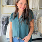 Meet your new go-to blouse for effortless, feminine style. The Dark Jade Ruffle Sleeve Blouse features delicate ruffle sleeves that add a soft, romantic touch to any look — whether you're dressing it up for a night out or keeping it casual for brunch with the girls.

Imagine slipping into this rich dark jade hue and feeling instantly put-together. The lightweight, flowy fabric drapes beautifully and moves with you all day long.

Ruffle sleeve detail for a feminine, elevated look
Rich dark jade colorway — ve