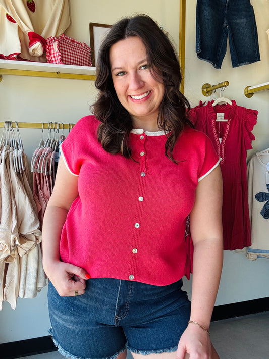 Staccato

Elevate your everyday rotation with this vibrant cherry red sweater featuring chic button details and a modern raw edge finish. This breathable, short-sleeve knit offers the perfect balance of effortless style and all-day comfort for any season.

Vibrant red for instant confidence.
Chic buttons add effortless style.
Modern raw edge adds flair.
Breathable knit keeps you cool.
Wide neck flatters every silhouette.
Transition seamlessly from desk to drinks.