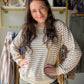 The kind of top you'll wear on repeat. The&nbsp;Ivory Micro Stripe Brushed Top by Staccato is a wardrobe workhorse with a polished edge — a soft micro-brushed stripe knit in ivory with a classic crew neck and ribbed banding that keeps everything looking neat and intentional. Long sleeves, cozy hand feel, and a silhouette that layers beautifully or stands on its own.

Why You'll Love It

Micro brushed stripe texture — subtle pattern with a soft, luxe hand feel
Classic crew neckline with ribbed banding — clea