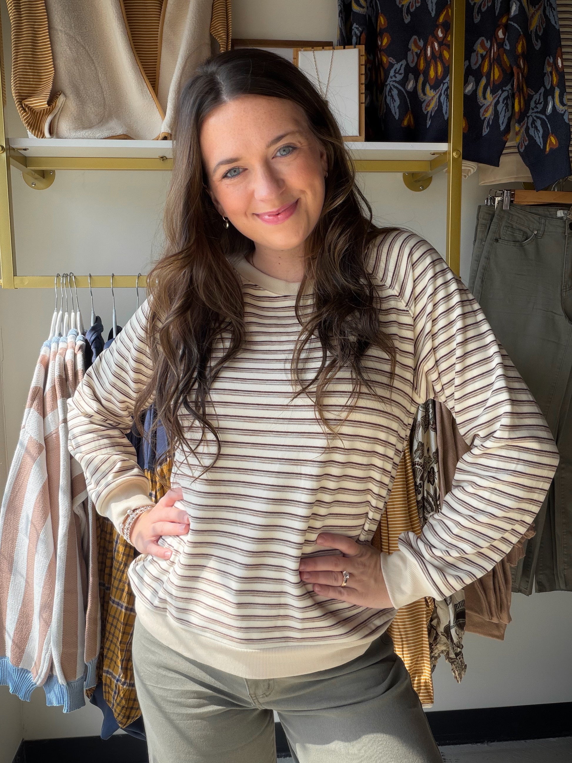 The kind of top you'll wear on repeat. The&nbsp;Ivory Micro Stripe Brushed Top by Staccato is a wardrobe workhorse with a polished edge — a soft micro-brushed stripe knit in ivory with a classic crew neck and ribbed banding that keeps everything looking neat and intentional. Long sleeves, cozy hand feel, and a silhouette that layers beautifully or stands on its own.

Why You'll Love It

Micro brushed stripe texture — subtle pattern with a soft, luxe hand feel
Classic crew neckline with ribbed banding — clea