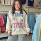 Bibi

Celebrate in style with this premium Bibi French terry sweatshirt featuring vintage-inspired "Stars and Stripes" patchwork and a trendy gingham side-bow accent. This oversized Americana pullover combines ultimate comfort with a festive, boutique-quality design perfect for 4th of July festivities.

Soft premium French terry fabric.
Charming blue gingham side-bow detail.
Unique mixed-print vintage patchwork lettering.
Relaxed, oversized fit for comfort.
Festive Americana stars and stripes.
High-quality 