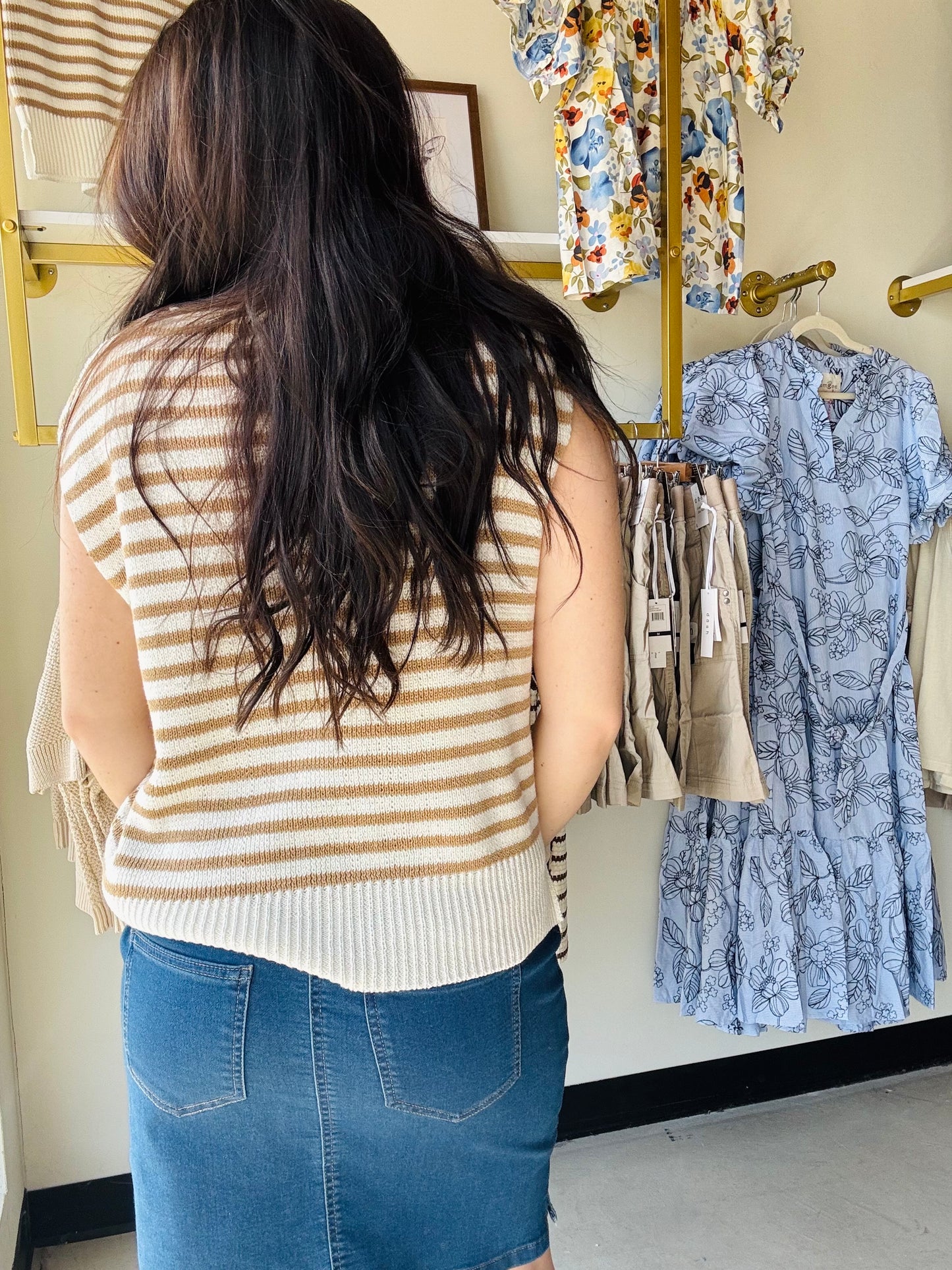 Staccato

This ivory and taupe striped sweater features a striking Y split neckline and cap sleeves for contemporary style. Ribbed contrast trim adds polished detailing throughout. Style it with denim and your favorite jean or linen jacket for an effortless look that works beautifully all spring and summer long. A versatile essential that transitions seamlessly from casual to refined.