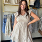 Hem &amp; Thread&nbsp;

Soft, sweet, and completely effortless. The Taupe Smocked Babydoll Dress is the kind of dress you reach for when you want to look put-together without putting in the work.

A smocked bodice fits and flatters beautifully, then flows into a relaxed babydoll silhouette that's breezy and comfortable all day long. Ruffle sleeves add a delicate, feminine touch, and the fully lined body means it drapes and moves exactly the way a great dress should. The warm taupe hue is endlessly versatile