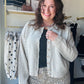 Wishlist&nbsp;

This lightweight cardigan features classic stripes and functional buttons for easy layering. Crafted from incredibly soft fabric, it's perfect for transitional weather or adding warmth without bulk. The relaxed fit makes it ideal for casual days or dressing up your favorite basics. A versatile piece that works with everything in your wardrobe.