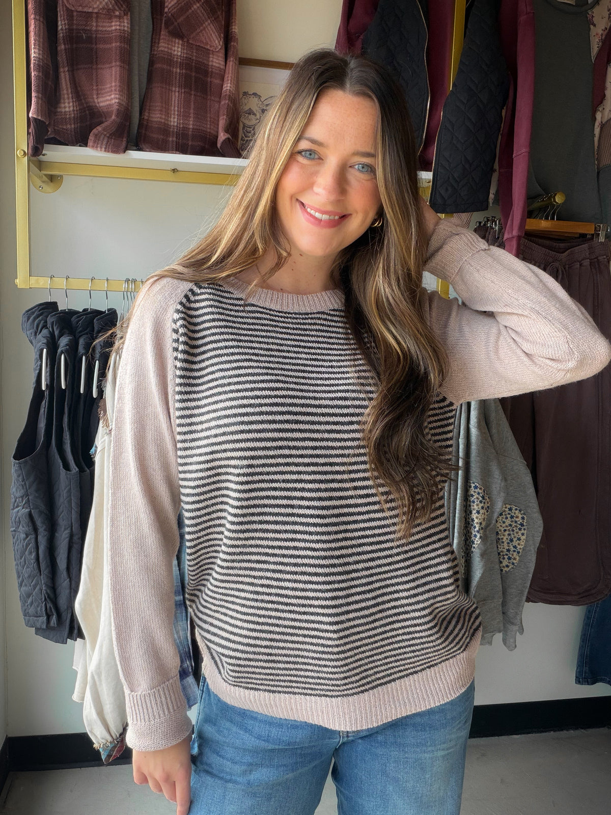 When a simple sweater needs a little more personality, this one brings it. The Black Striped Accent Sweater by Staccato pairs a sporty, baseball-inspired feel with color blocking and fine pinstripes. Throw it on with your favorite jeans for an easy outfit that still has plenty of detail.

What you'll love

Color-blocked design with pinstripe accents.
Crew neckline and long sleeves.
100% polyester.
Style &amp; size notes

Pair it with denim and sneakers for daytime, or try it with dark trousers and boots. Av