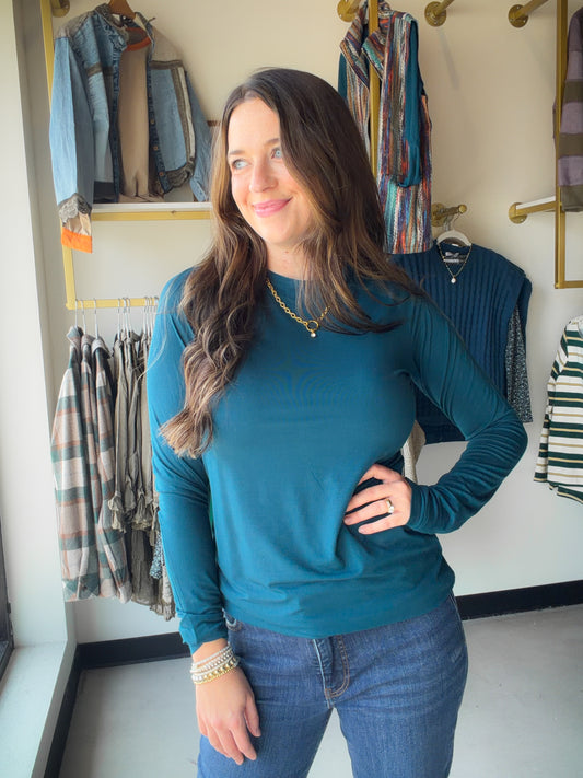 Michelle Mae

Effortlessly blend style and comfort with this new long sleeve top. Designed with stretchy fabric, a fitted silhouette, added thumbholes and it features a high neck line for a chic touch. You can also tuck it in for a faux bodysuit look.&nbsp;

Fabric Content: 95% Rayon, 5% Spandex
Fabric Style: Soft, breathable knit
Stretch Factor: High stretch
Fit: Runs true to size&nbsp;
