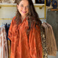 Earthy, textured, and entirely your style. The&nbsp;Terracotta Tie Leaf Jacquard Top by Umgee is a bohemian statement piece that feels as beautiful as it looks. A tonal leaf jacquard weave adds rich dimension to warm terracotta, while billowing balloon sleeves and a tie-front V-neckline give it that relaxed, effortlessly elevated boho energy you love.

Why You'll Love It

Tonal leaf jacquard design — subtle texture with serious visual impact
Split V-neckline with adjustable tassel ties — bohemian charm, you