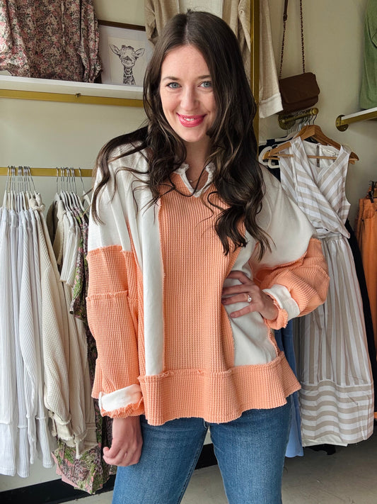 POL

Designed in notched neck long sleeve oversized fit knit top featured in french terry and thermal, frayed edge on entire garment.