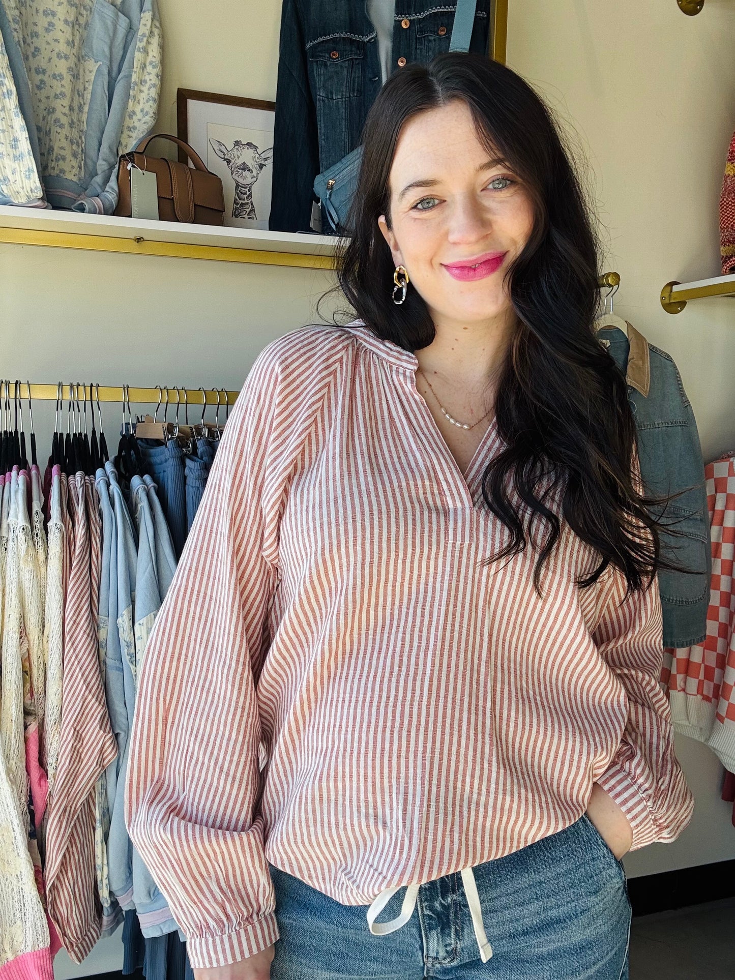 Thread &amp; Supply

So polished and chic, this easy cotton top is featured in a relaxed fit, v neckline and puff sleeve detail for some added style.

V neckline
Raglan sleeves
Measurements for a size small:

Length: 23.5"
Chest: 20"
Sleeve Length: 28.5"
Fabric Content/Care:&nbsp;

55% Cotton
45% Rayon
Machine Wash Cold